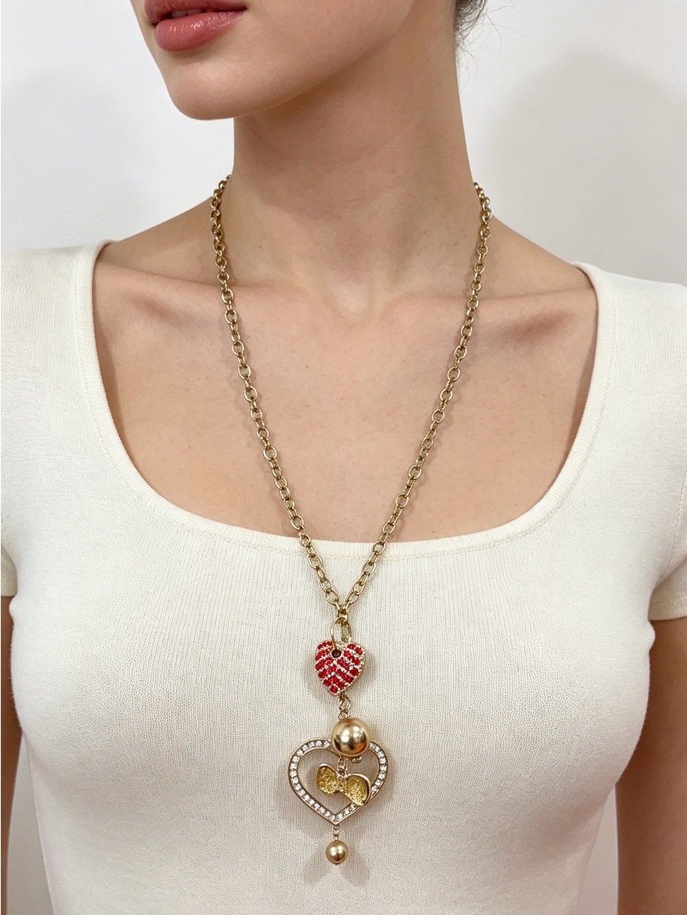 Gold-Tone Heart Pendant Necklace with Red Crystal Accent